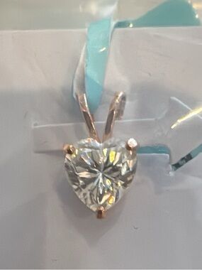 14k Heart Pendant moisonite tests positive for diamond